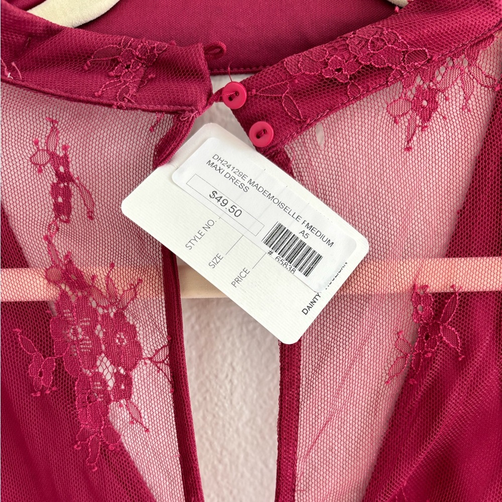 Mini romper with maxi lace overlay. Magenta color. NWT. Size medium.